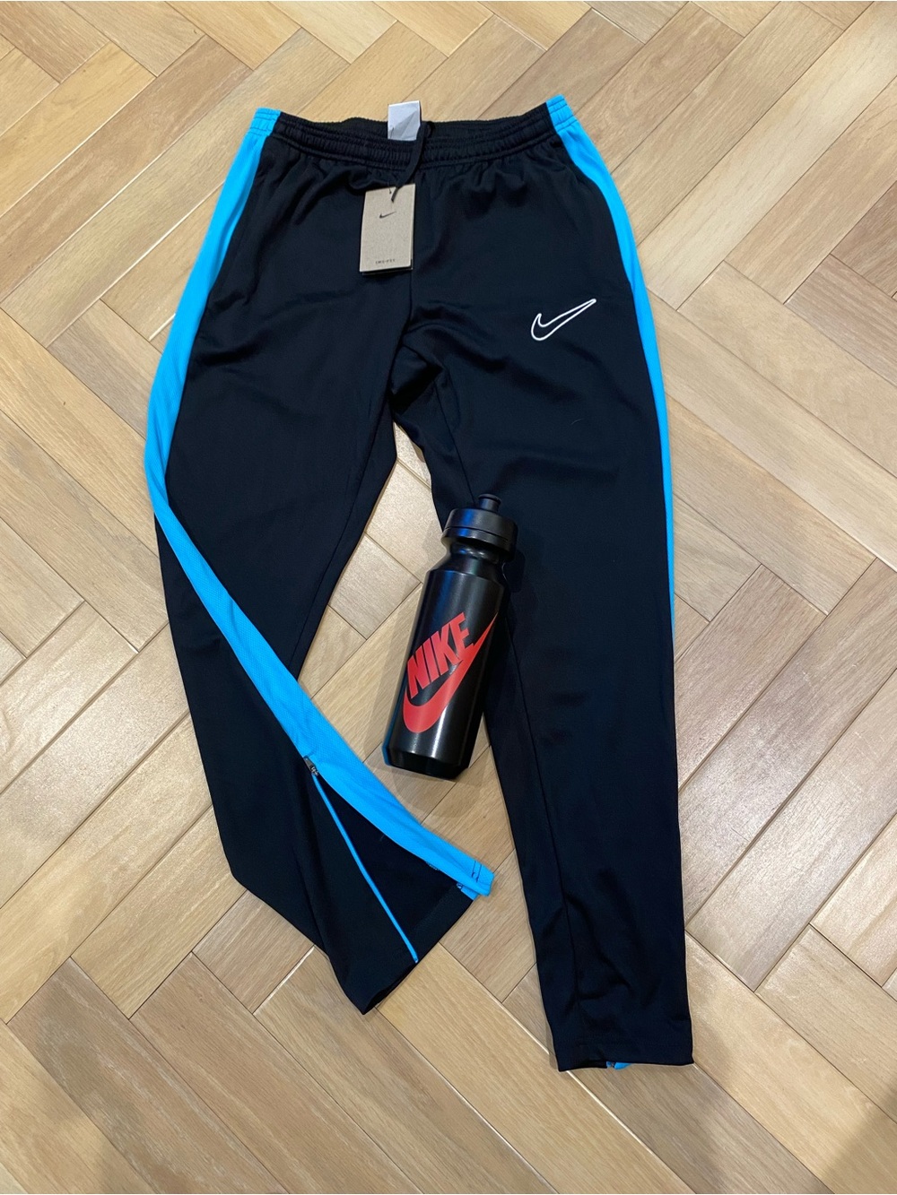 Nike Dri-Fit Black Joggers with Bright Blue Side Panels